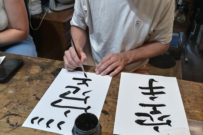 Calligraphy on T-shirt or lantern near Skytree Tokyo - Choosing Your Canvas: Shirt, Lantern, or Umbrella