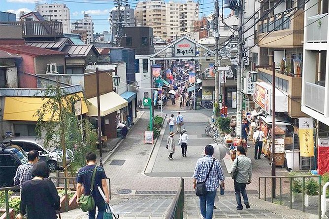 Experience Old local Tokyo & traditional food in Yanaka Ginza - A 4.5-Hour Walk Through Cat Stamps, Fried Snacks, and Shrine Space