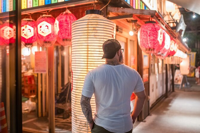 Experience Tokyo Through the Lens of a Local Artist - Kabukicho District (Stop 2): neon energy with a human pace