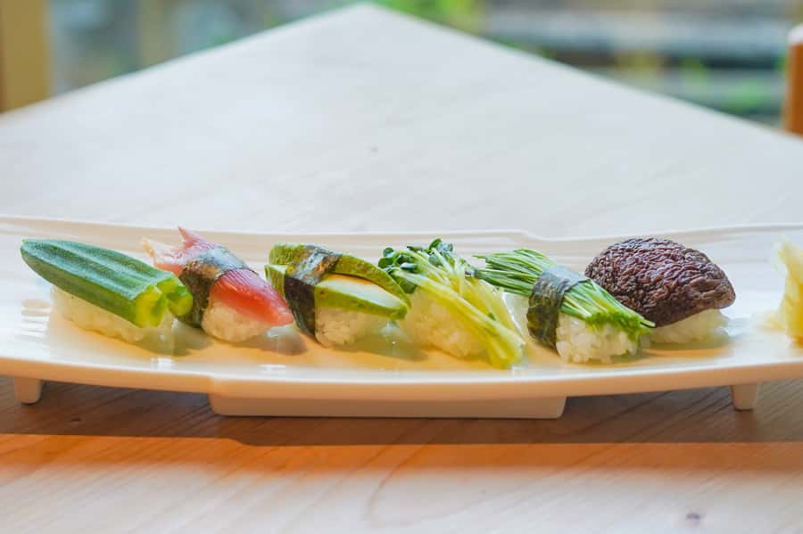 Modern Vegan Night Foodie Tour in Tokyo - The food lineup: vegan sushi, vegan okonomiyaki, and drink breaks