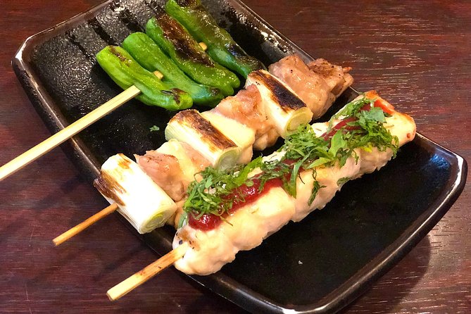 Shinjuku Golden Gai Food Tour in Spanish - Robot, Samurai, and shrine moments: what these stops add