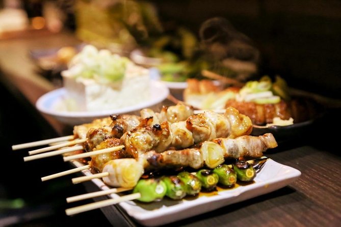 Shinjuku Golden Gai Food Tour in Spanish - Four tastings that actually teach you what to order