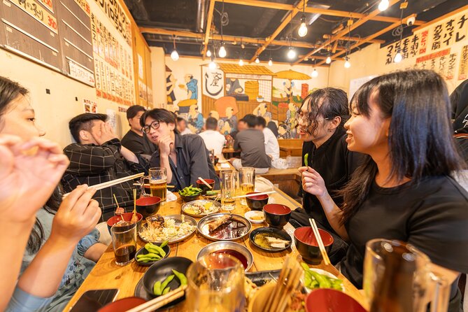 Shinjuku Underground Nightlife Tour: Izakaya Food & Bar Hopping - Omoide Yokocho izakaya dinner: 10+ dishes in a narrow, lantern-lit alley