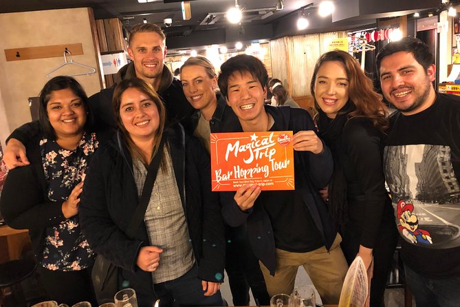 Tokyo Bar Hopping Tour in Shinjuku (All-You-Can-Drink + Dinner) - Stop 2: Kabukicho Area, the Godzilla Head Photo Moment, and the Loud-Live Change