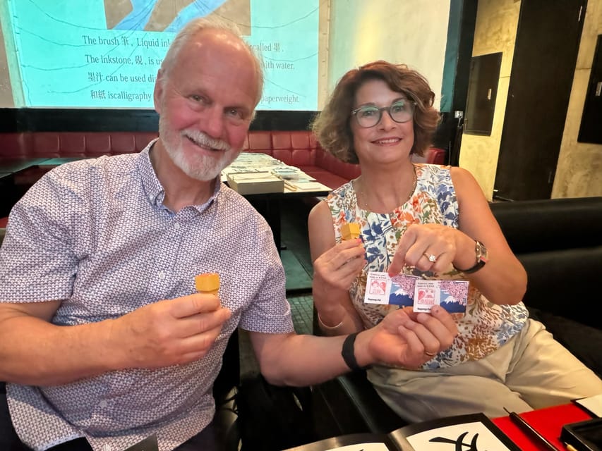 Tokyo: Calligraphy on Kanji Fan & Scroll with Drink - Make your own hanko stamp: the souvenir you will actually use