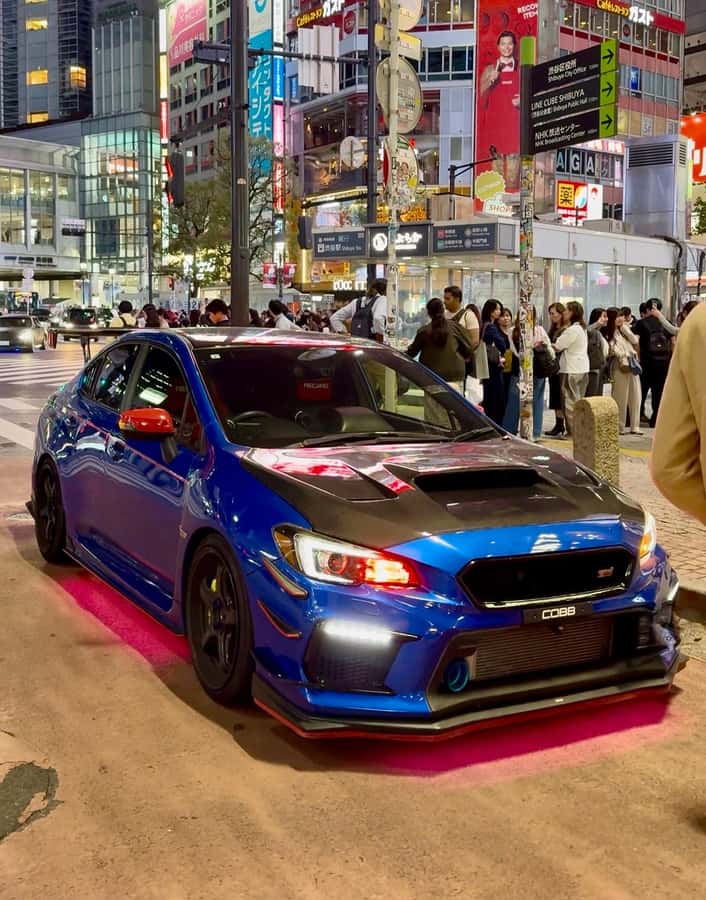 Tokyo: Daikoku PA & Shibuya Private Tour in a WRX STI - Shibuya After Dark: City Lights Plus Real Local Car Talk