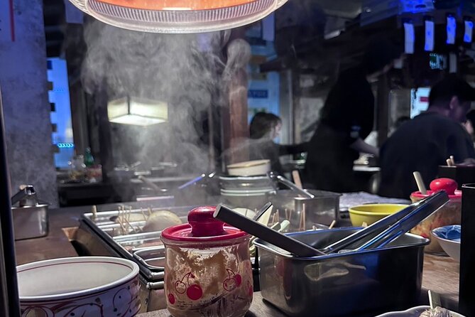 Tokyo: Private Shibuya Bar Crawl Tour -3 Drinks & Local Foods- - Stop 3: Dagashi-Bar for retro snacks and simple drinks