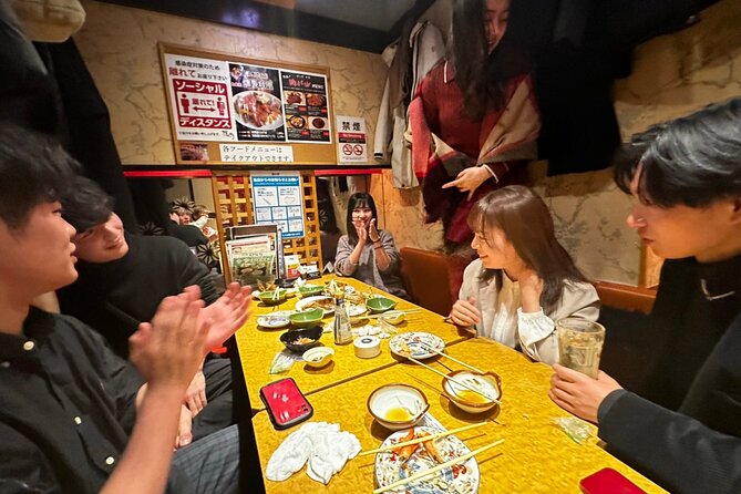 Tokyo: Private Shibuya Bar Crawl Tour -3 Drinks & Local Foods- - Stop 1: Tengu Dai Hall inside Shibuya Mark City (the big, friendly opener)