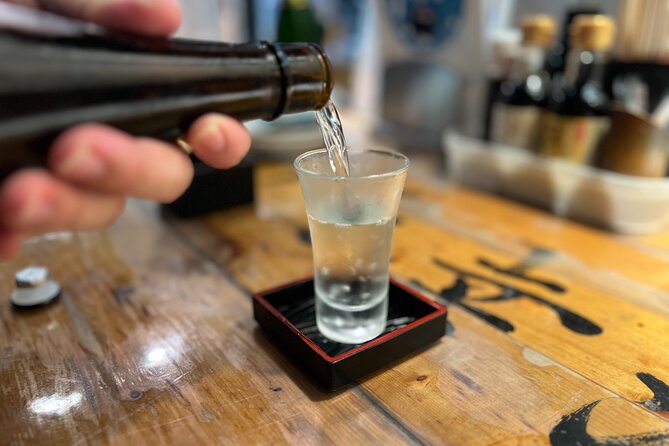 Tokyo: Shinjuku Food Tour (13 Dishes at 4 Local Eateries) - Stop 1: Omoide Yokocho and Its Stall-Driven Izakaya Energy