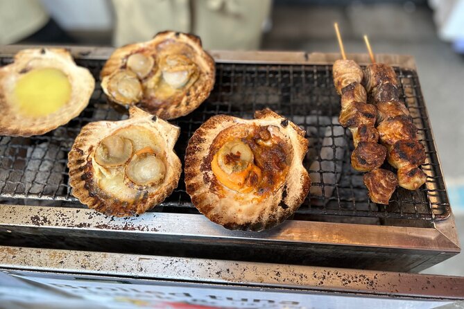 Tokyo Tsukiji Fish Market Food and Walking Tour - Value check: $21.14, admissions included, and a guide that points