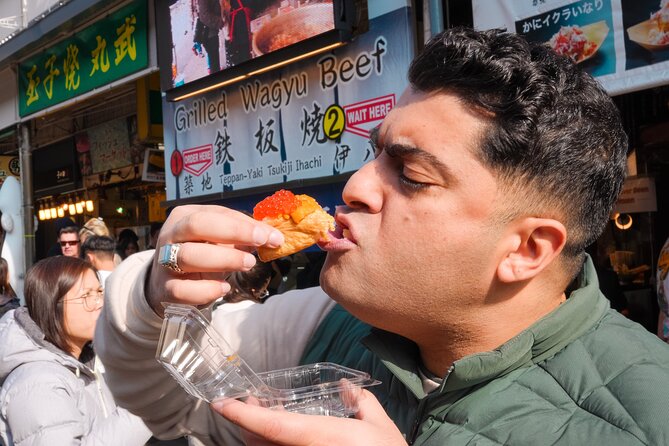 Tokyo Tsukiji Fish Market Food & Culture Walking Tour - Stop 1: Tsukiji Hongwanji Temple and its unusual Indian architectural style